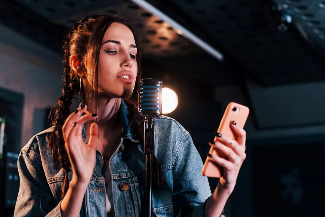 Image of a person with a phone